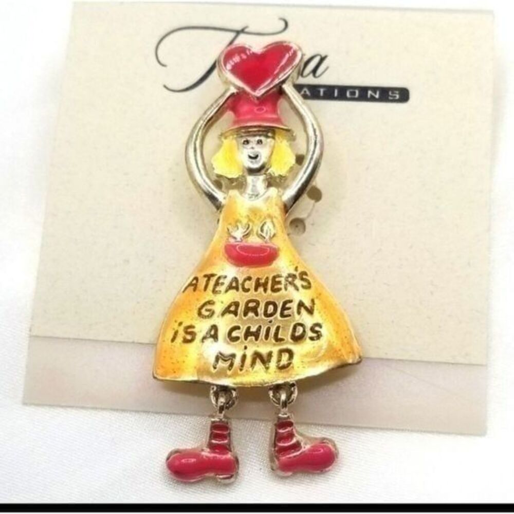 Gold toned teacher broach pin clip